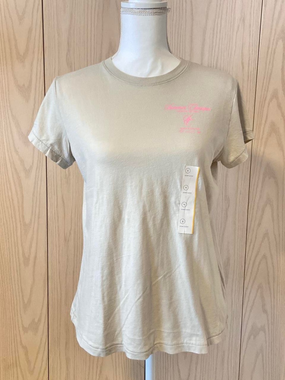Universal Thread Women's Short Sleeve Crewneck Tee in Light Beige with Pink Logo